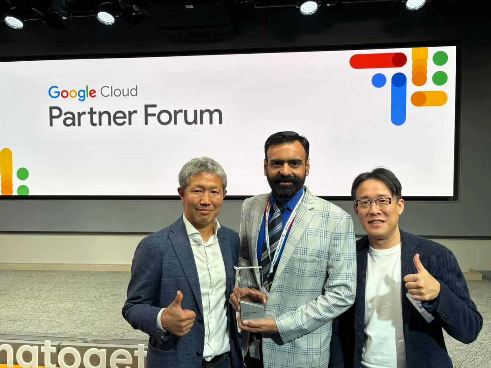 Cloud Ace team on stage receiving GCP Partner of the Year recognition at the Google JAPAC Partner Forum 2025