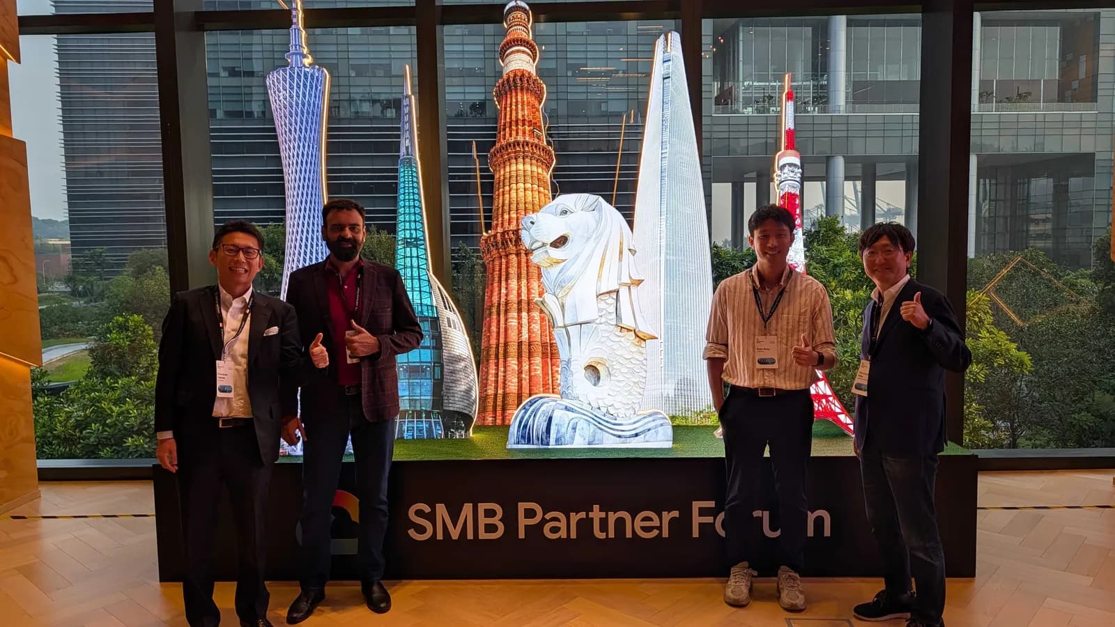 Cloud Ace team at the SMB Partner Forum landmark display in Singapore